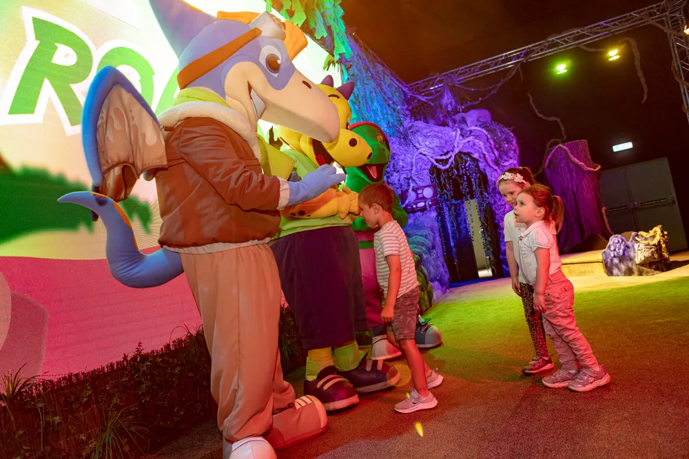 Terry and Dippy meeting children on stage at Dippy’s Theatre