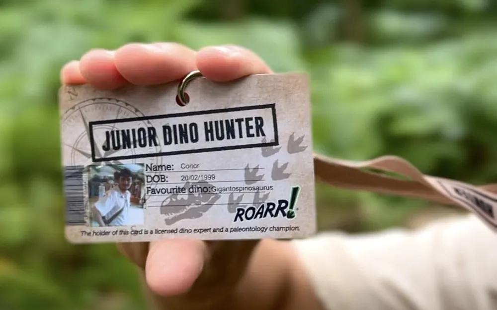 A Junior Dino Hunter ID card keepsake from the ROARR! STORE