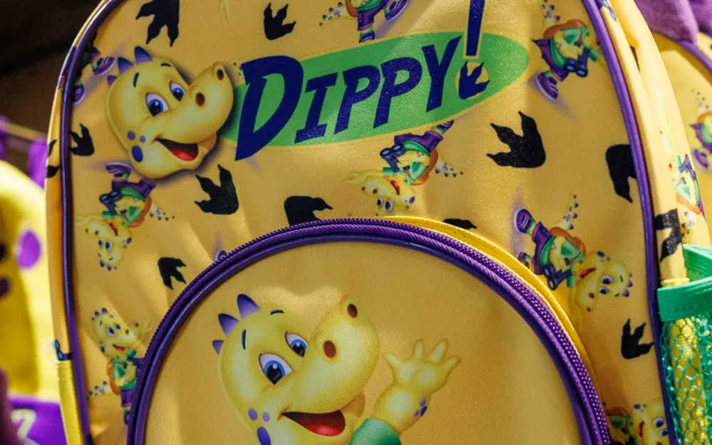 A Dippy dinosaur backpack in the ROARR! STORE