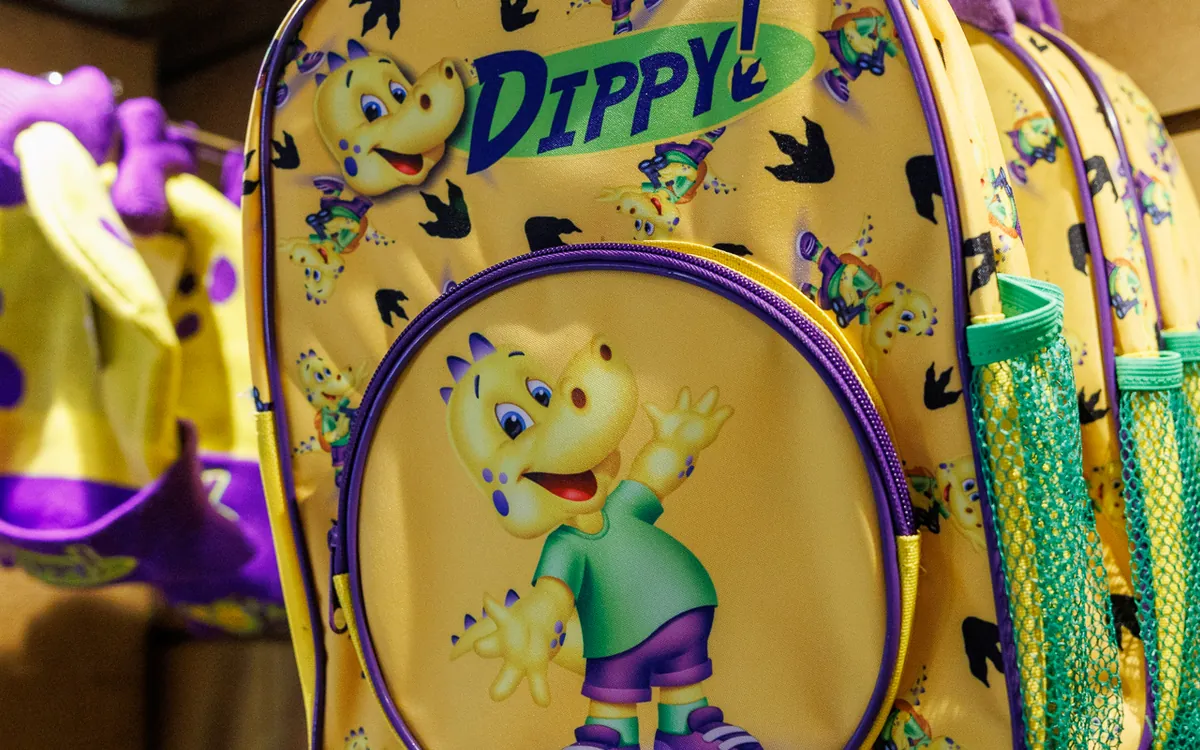 Dippy backpacks and dinosaur bags on the rail in the ROARR! STORE
