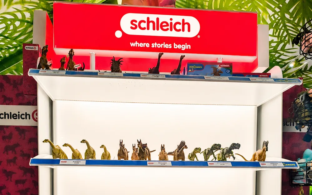 A Schleich dinosaur figures display stand in the ROARR! STORE